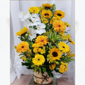ARRANJO DE ORQUÍDEA COM
GIRASSOL E GÉRBERAS